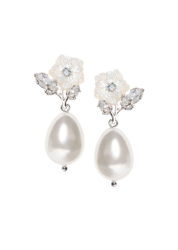 A pair of pearl drop earrings accented with crystals and a mother of pearl flower. 