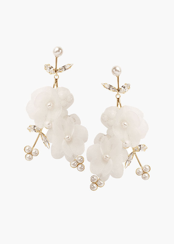 Gold floral pearl crystal chandelier earring on white background 