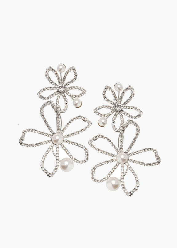 Swarovski crystal and pearl double flower statement earring on white background 