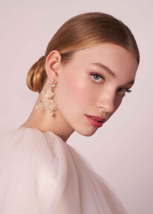 Blush Silk floral gold chandelier earring with pearl accents on model side view 