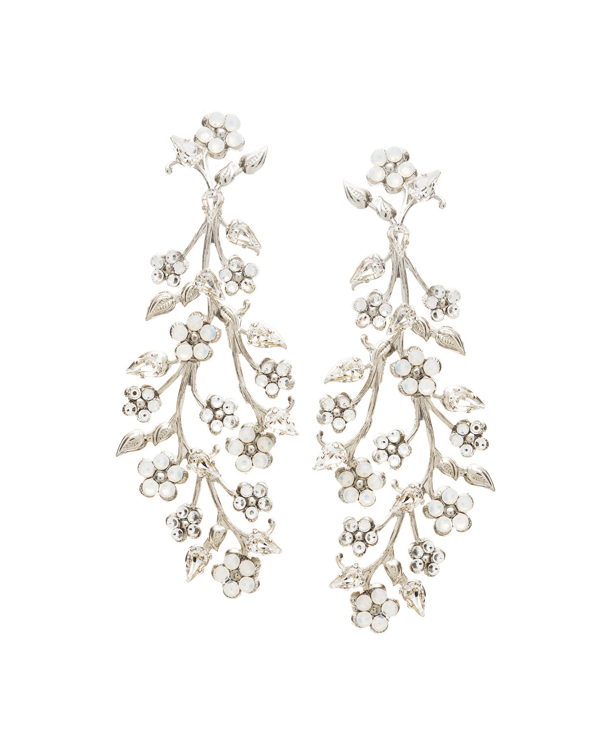 A pair of floral statement earrings on white background