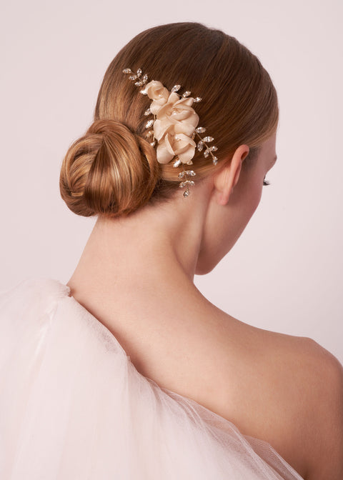 Silk floral and Swarovski wedding crystal hair comb on model back view 
