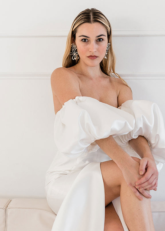 Swarovski crystal and pearl double flower statement earring on model in white gown front view