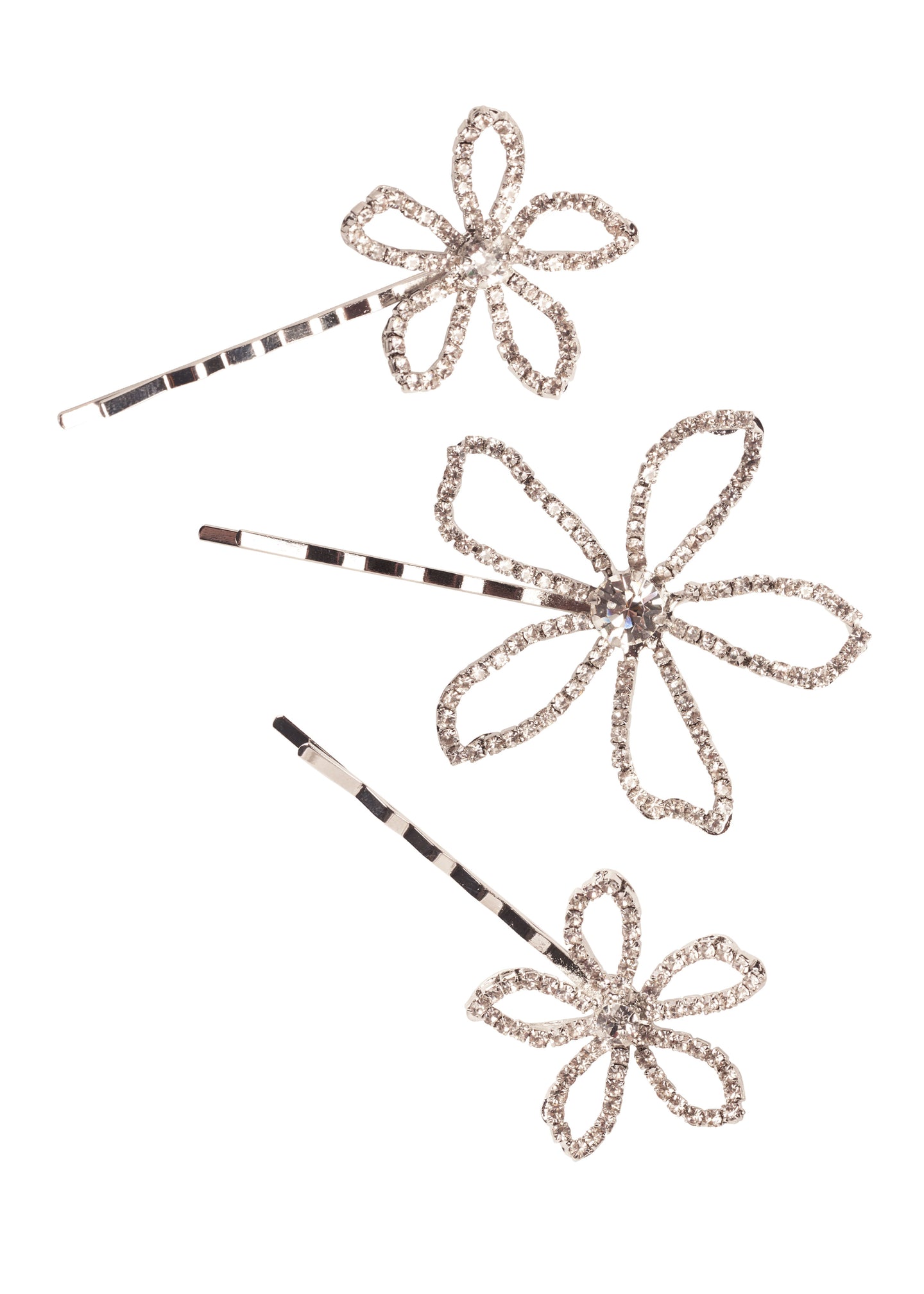 A set or 3 floral crystal silver hairpins on white background